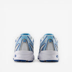 Rear view of blue and white New Balance sneakers, athletic footwear, mesh and synthetic design