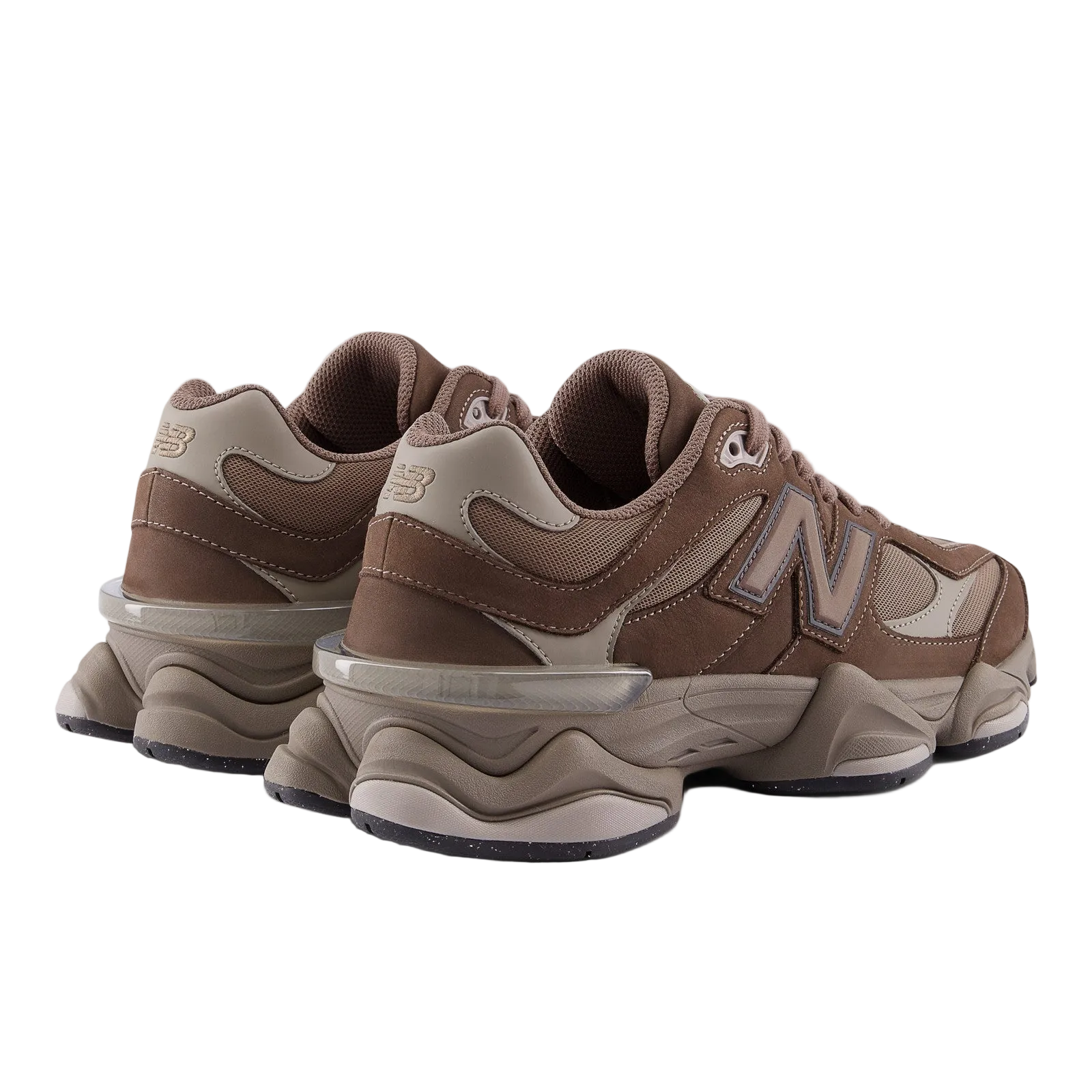 Brown and beige New Balance sneakers, athletic footwear with chunky sole, side angle view