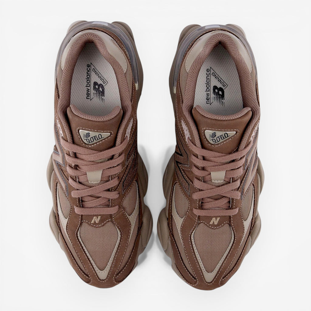 Brown New Balance 9060 sneakers top view, mesh and suede athletic footwear