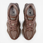 Brown New Balance 9060 sneakers top view, mesh and suede athletic footwear