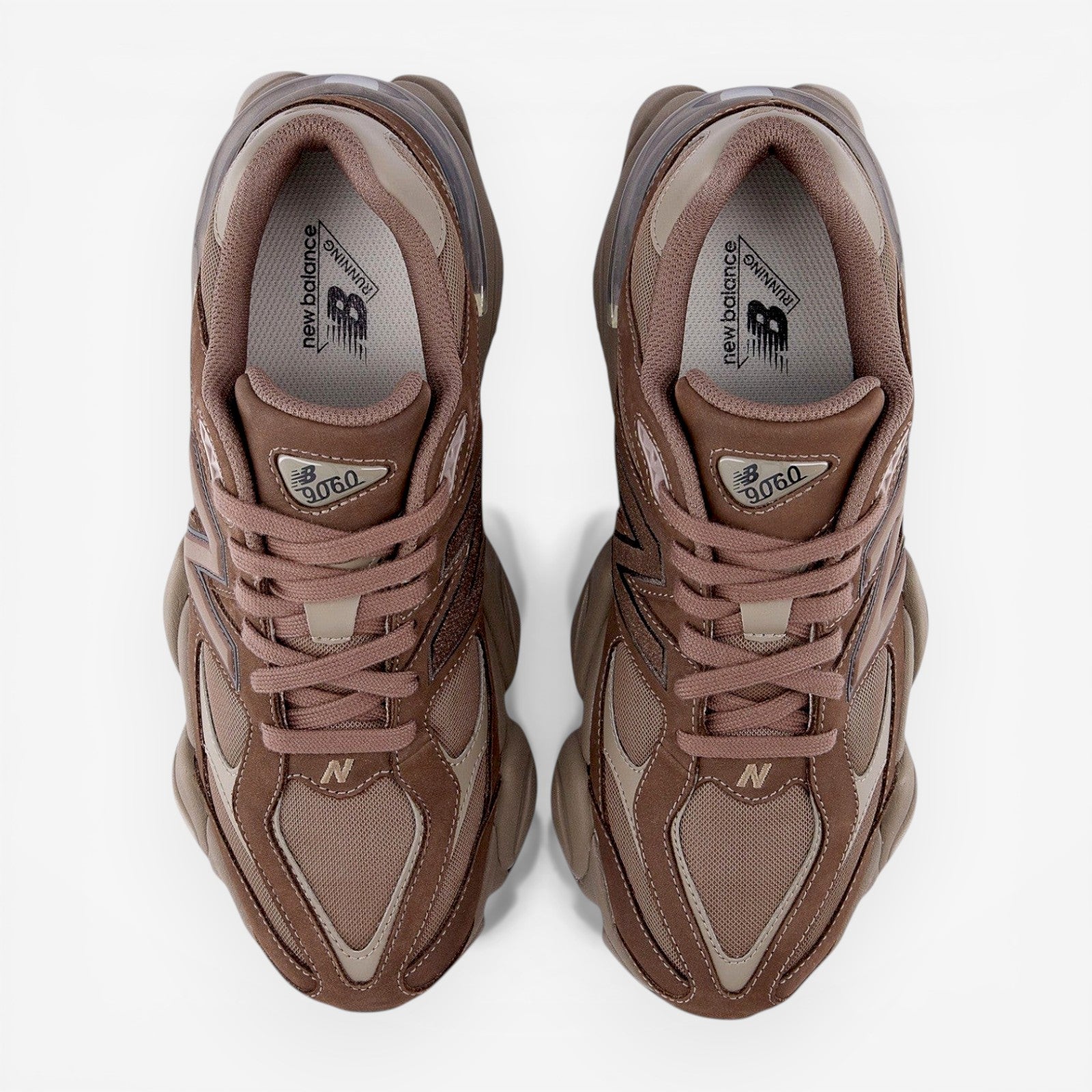 Brown New Balance 9060 sneakers top view, mesh and suede athletic footwear