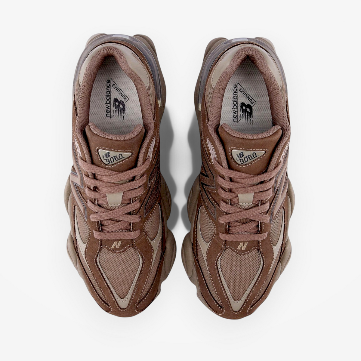 Brown New Balance 9060 sneakers top view, mesh and suede athletic footwear
