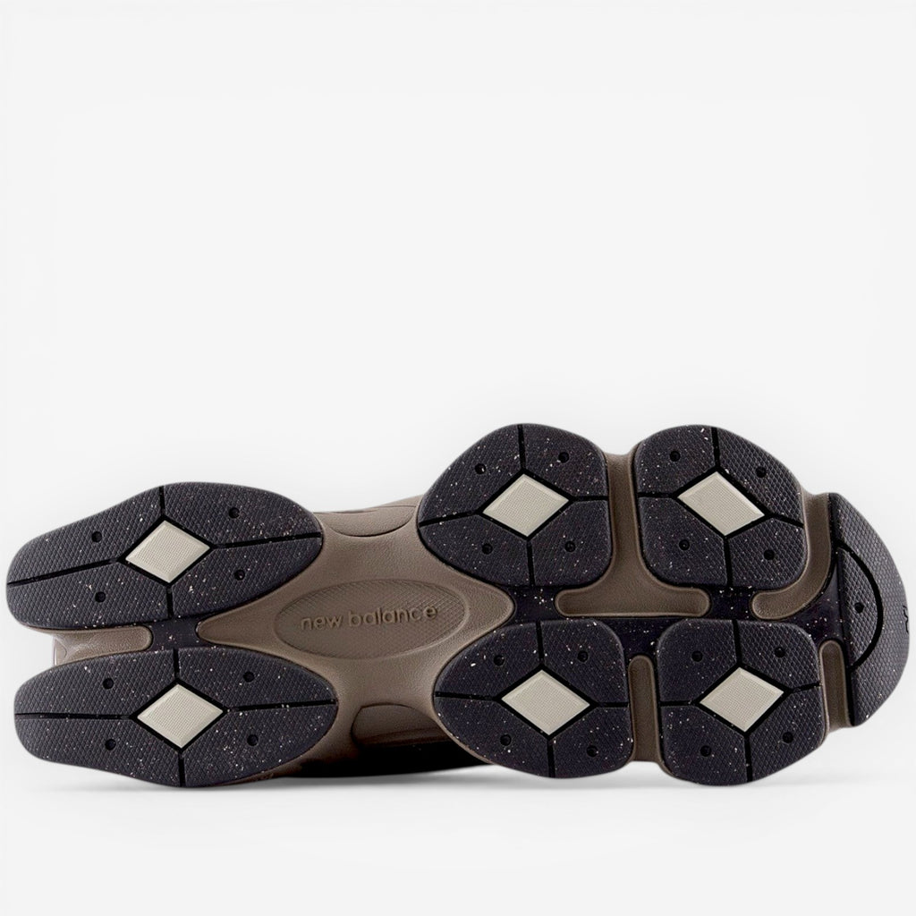 new balance sneaker sole with textured black and grey outsole, footwear detail