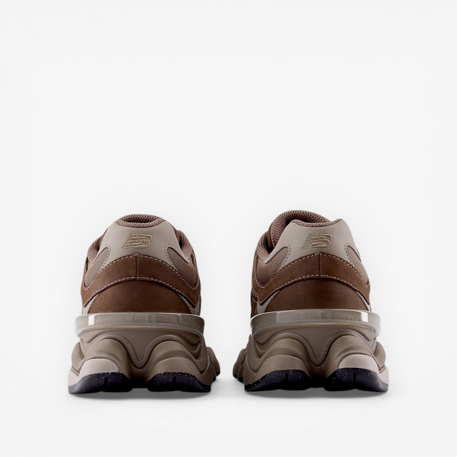 rear view of brown New Balance sneakers, athletic footwear with mesh and suede details