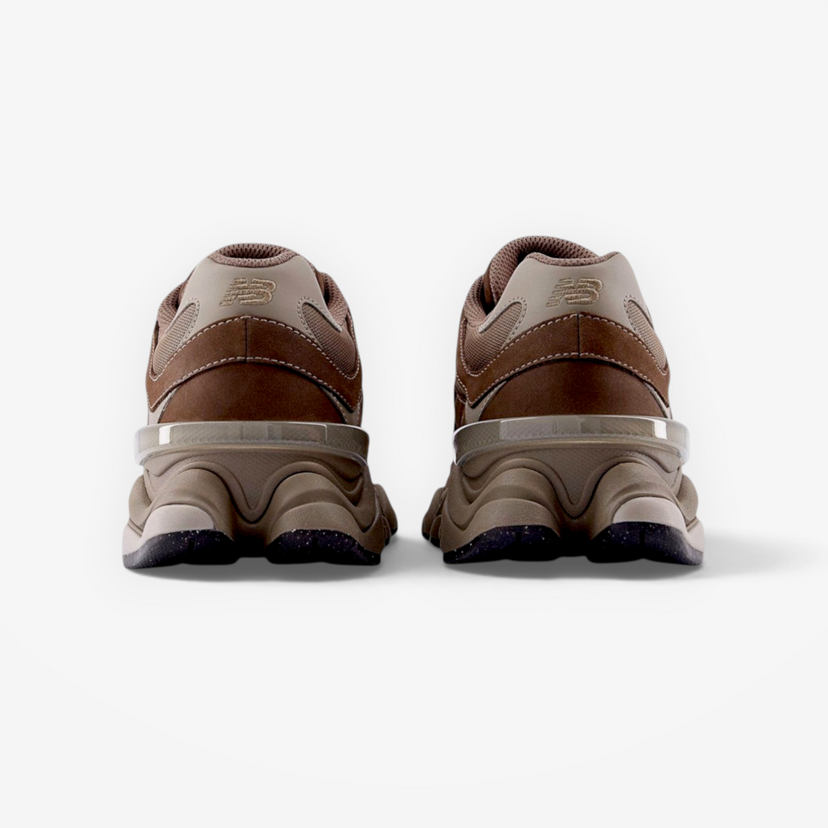 rear view of brown New Balance sneakers, athletic footwear with mesh and suede details