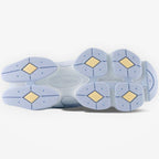METRO New Balance 9060 sea salt oxford blue sneakers with mesh and suede overlays, ABZORB & SBS cushioning.