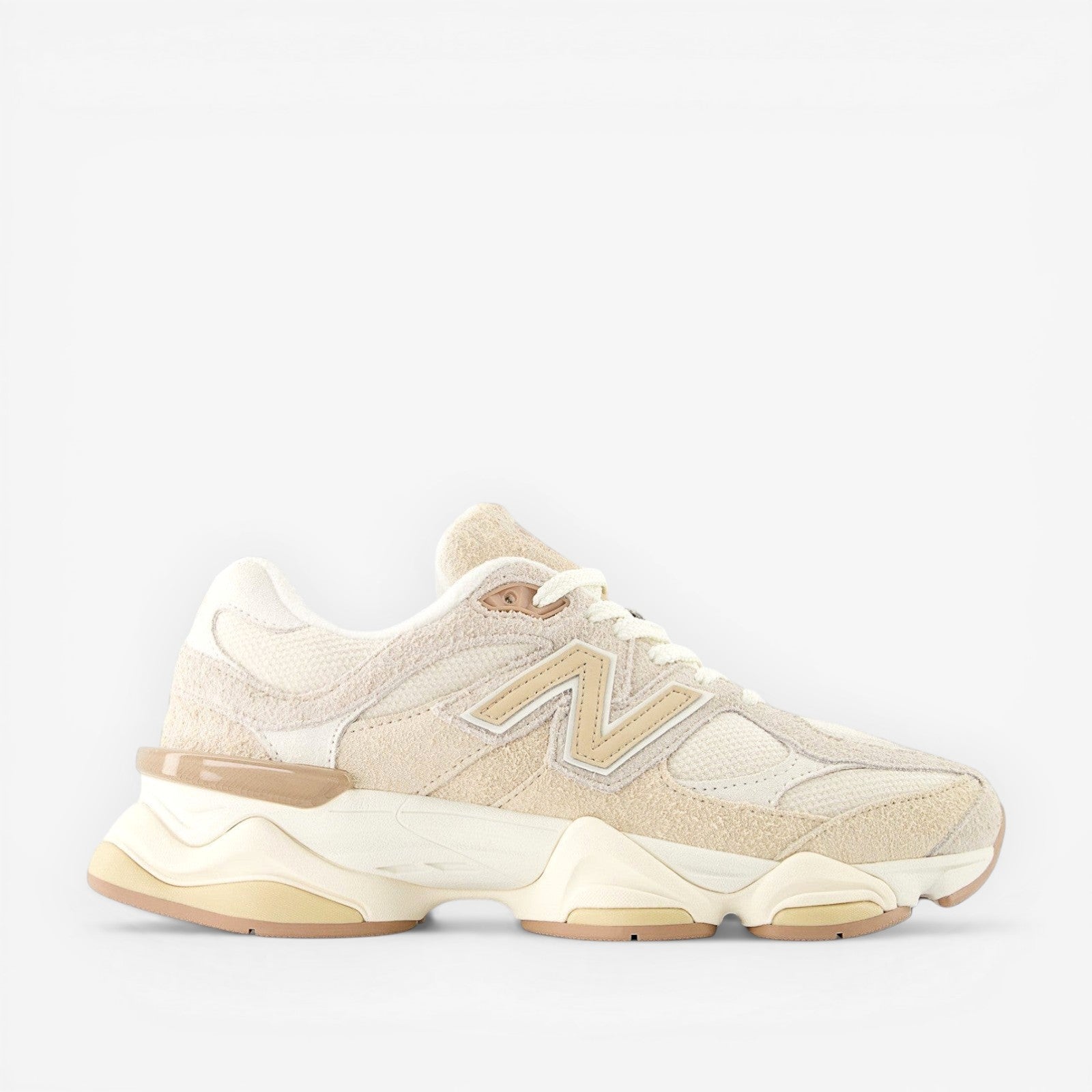 new balance beige suede and mesh sneaker, side profile, premium footwear, lifestyle sneakers