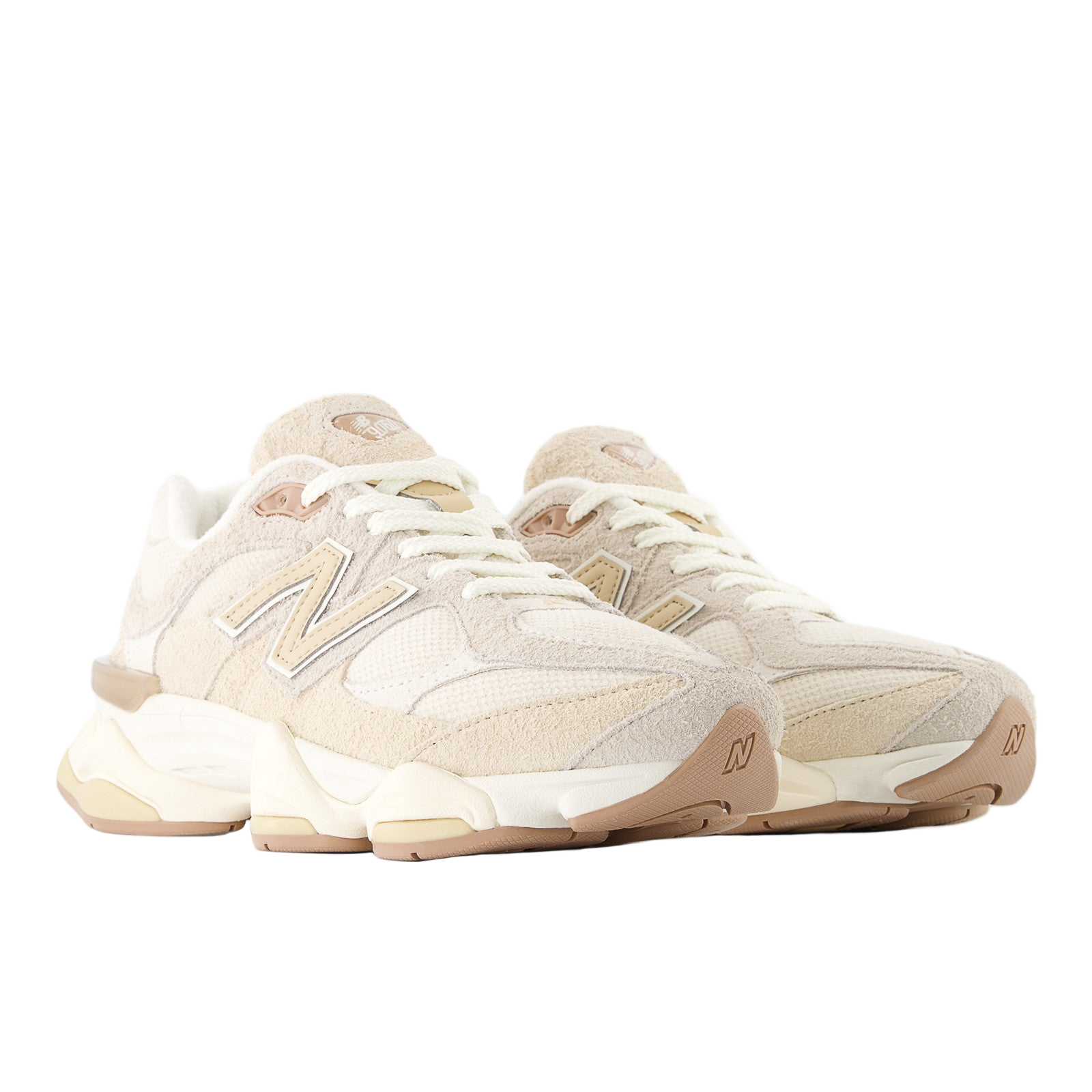 Beige suede and mesh New Balance sneakers with neutral tones and chunky sole, lifestyle footwear