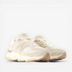 Beige suede and mesh New Balance sneakers with neutral tones and chunky sole, lifestyle footwear