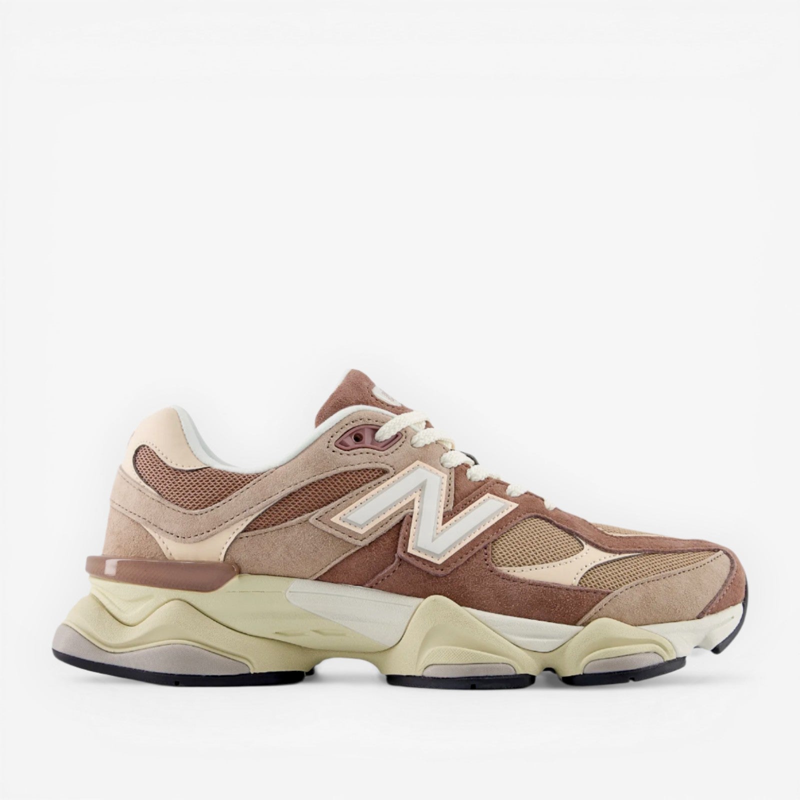 Brown and beige New Balance sneaker with suede and mesh panels, chunky sole, side logo