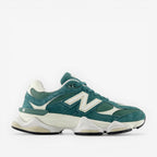 Teal New Balance sneaker with white sole and mesh panels, stylish athletic footwear