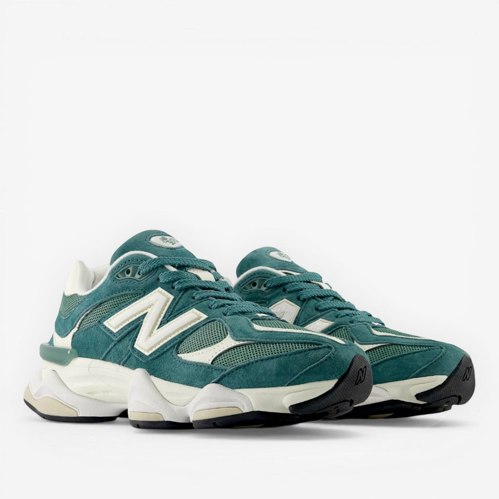 Green mesh and suede New Balance sneakers with white logo, modern chunky sole, footwear