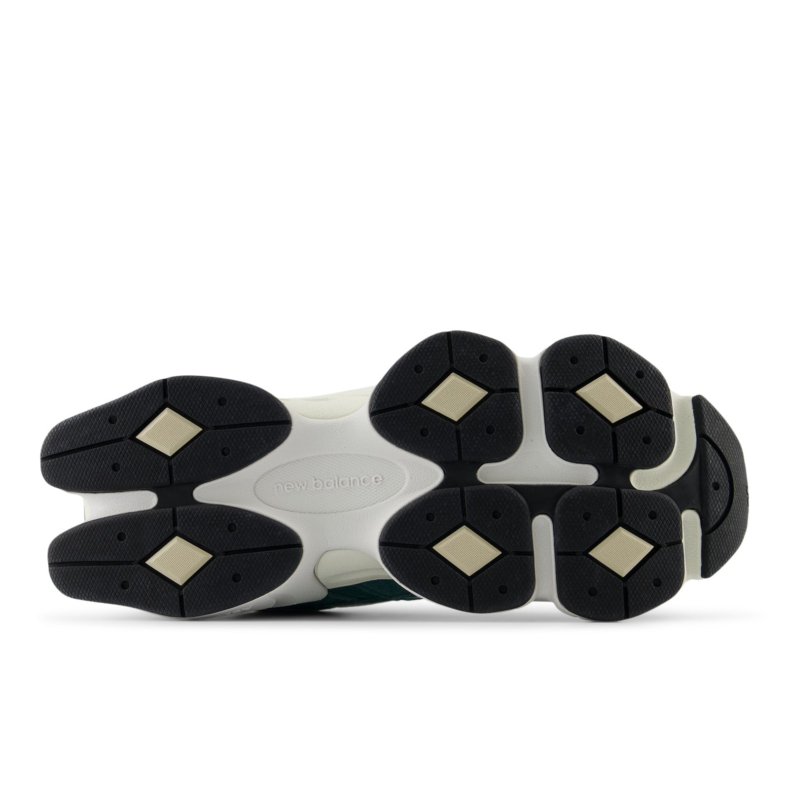New Balance sneaker outsole with black geometric grip, athletic footwear design