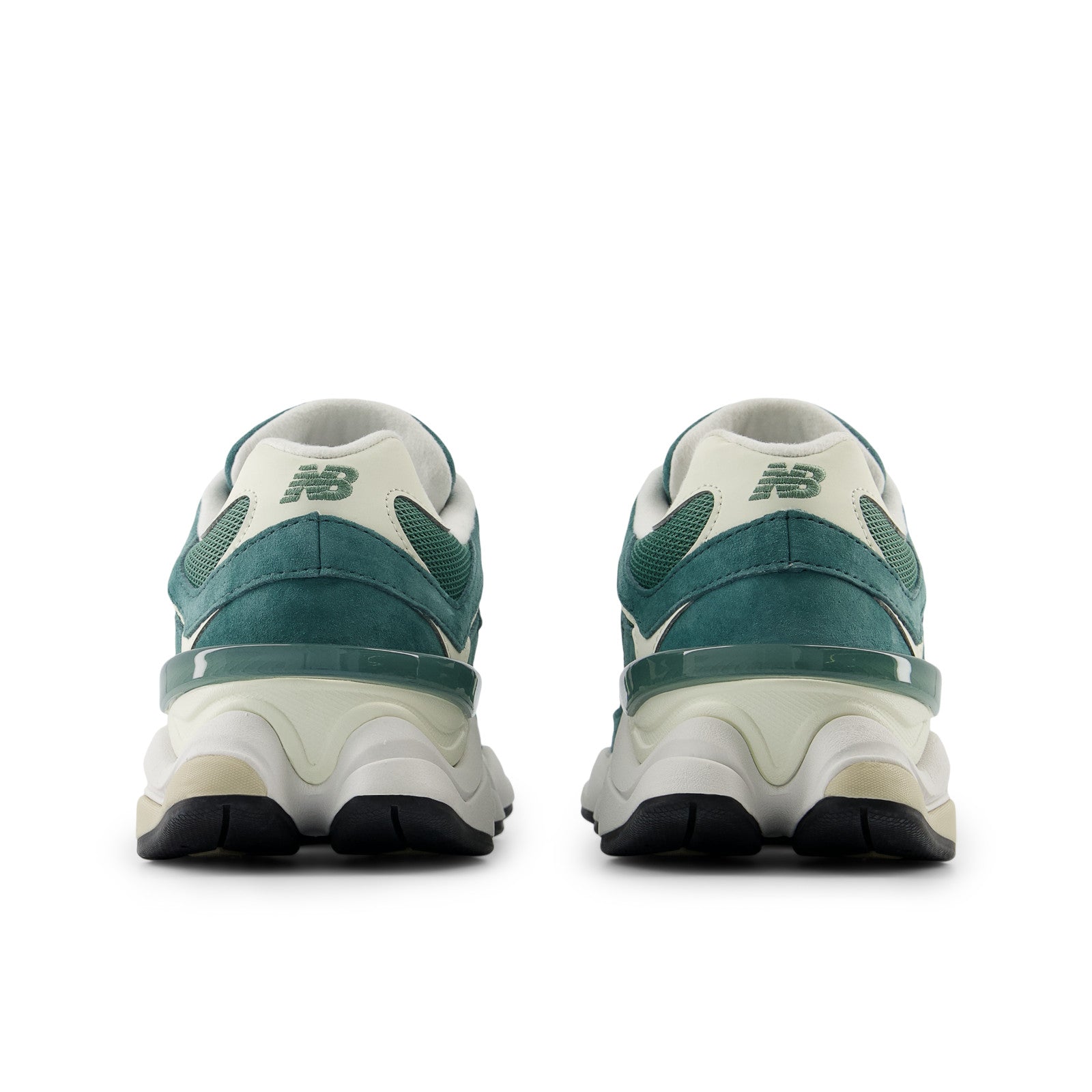 Back view of green and white New Balance sneakers with chunky sole, footwear sneakers