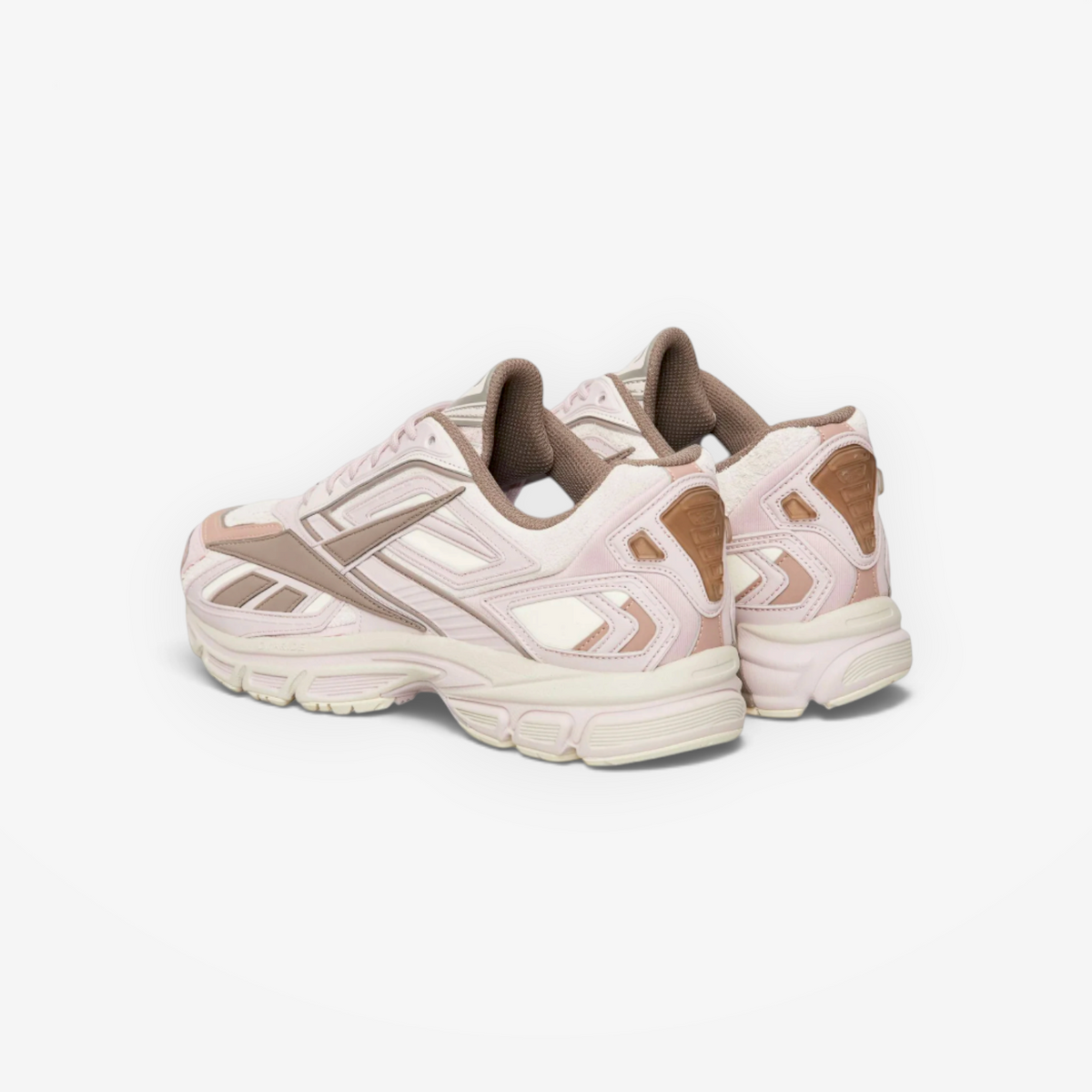 Reebok Premier Road Ultra sneakers in elemental pink and gritty grey with a layered paneled design and sculpted sole.