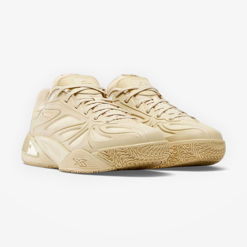METRO Angel Reese 1 basketball shoes in a neutral beige colorway with engineered mesh and synthetic overlays.
