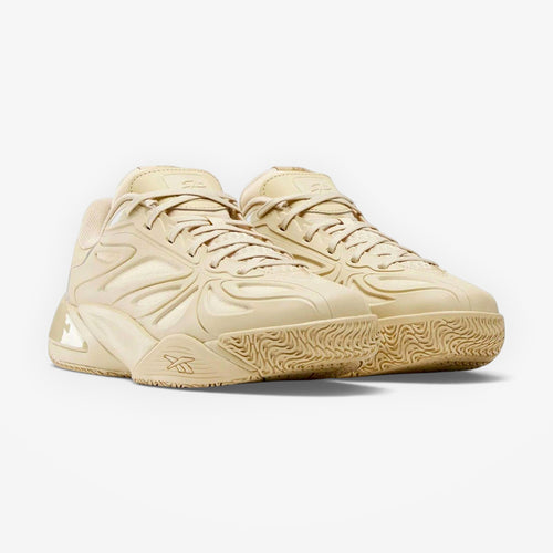 METRO Angel Reese 1 basketball shoes in a neutral beige colorway with engineered mesh and synthetic overlays.