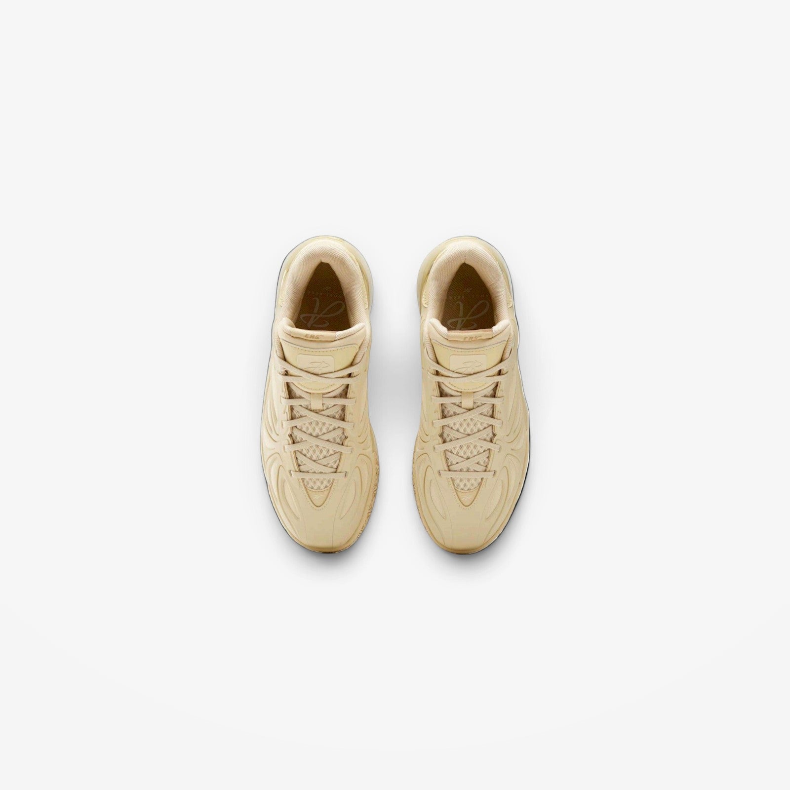 METRO Angel Reese 1 basketball shoes in beige with engineered mesh upper and lace-up closure, top-down view.