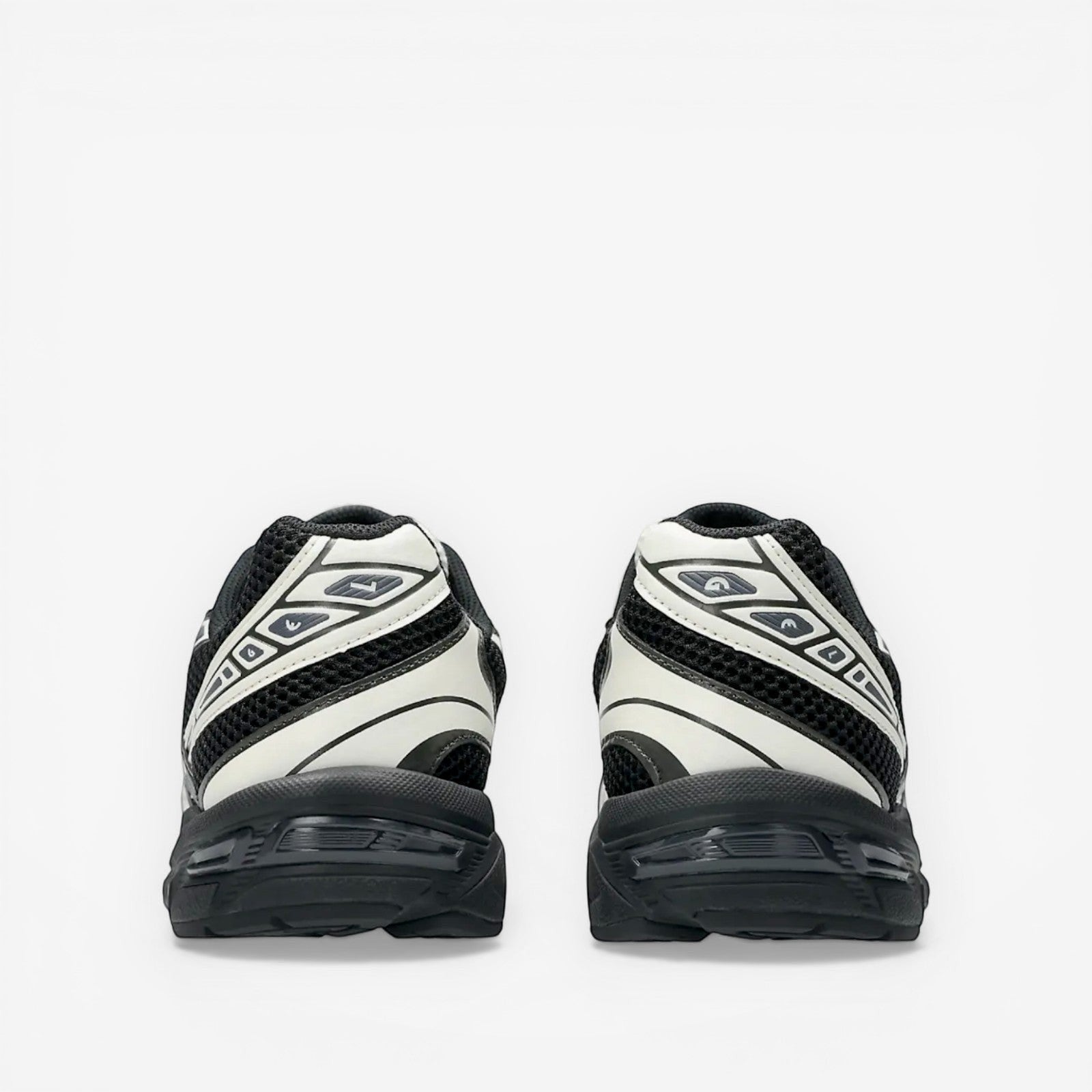 METRO ASICS GEL-1130 black and cream retro running shoes with mesh and synthetic overlays.