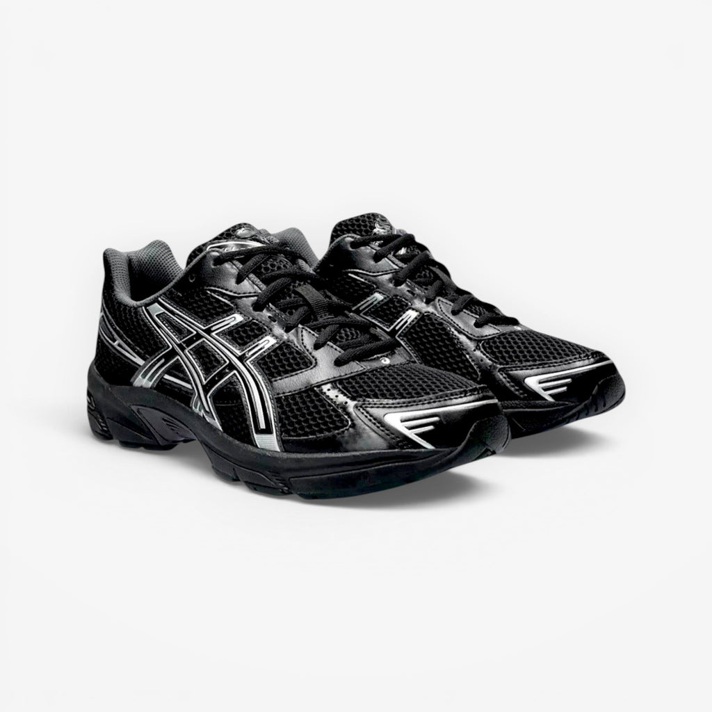 METRO ASICS GEL-1130 black and pure silver mesh and synthetic leather running shoes with GEL cushioning and TRUSSTIC support.