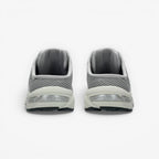 Rear view of METRO ASICS GEL-1130 Mule in Piedmont Grey and Pure Silver with mesh upper and GEL cushioning.