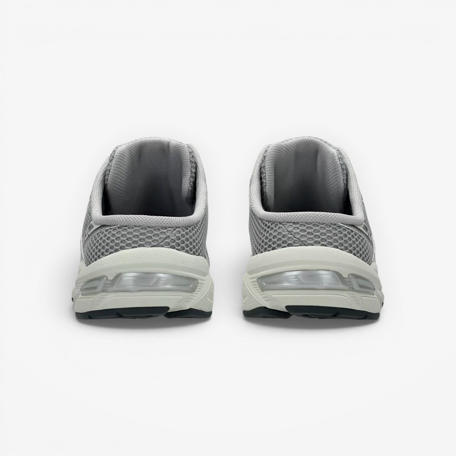 Rear view of METRO ASICS GEL-1130 Mule in Piedmont Grey and Pure Silver with mesh upper and GEL cushioning.
