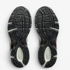 METRO ASICS GEL-1130 Mule sneaker outsoles in Piedmont Grey and Pure Silver with durable rubber traction patterns.