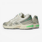 METRO ASICS GEL-1130 NS cream and carbon running shoes with green GEL cushioning and rip-stop details.