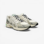 METRO ASICS GEL-1130 NS cream and carbon rip-stop running shoes with GEL cushioning and TRUSSTIC support.