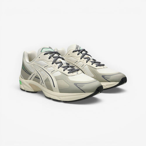 METRO ASICS GEL-1130 NS cream and carbon rip-stop running shoes with GEL cushioning and TRUSSTIC support.