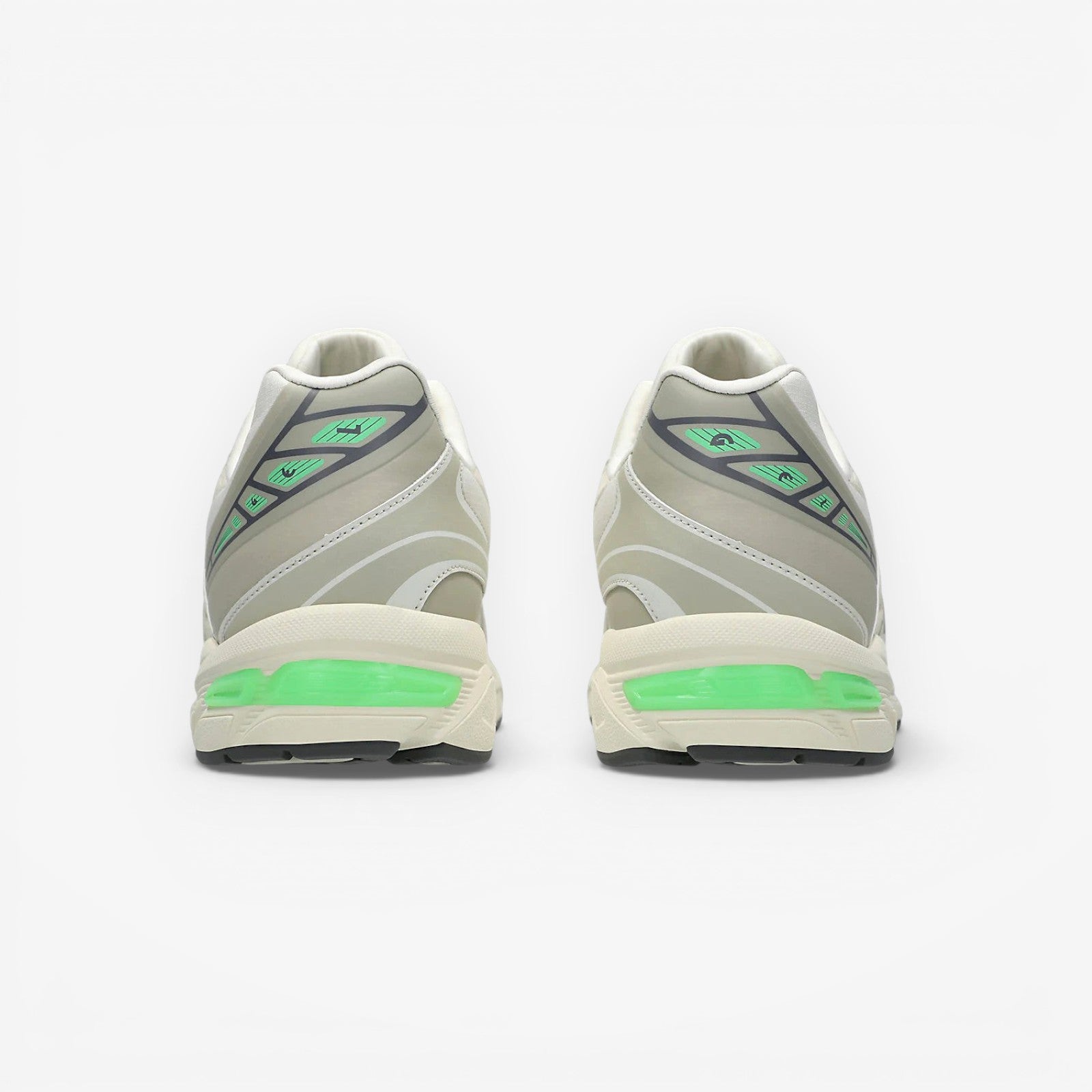 METRO ASICS GEL-1130 NS cream and carbon running shoes with green GEL cushioning and grey accents.