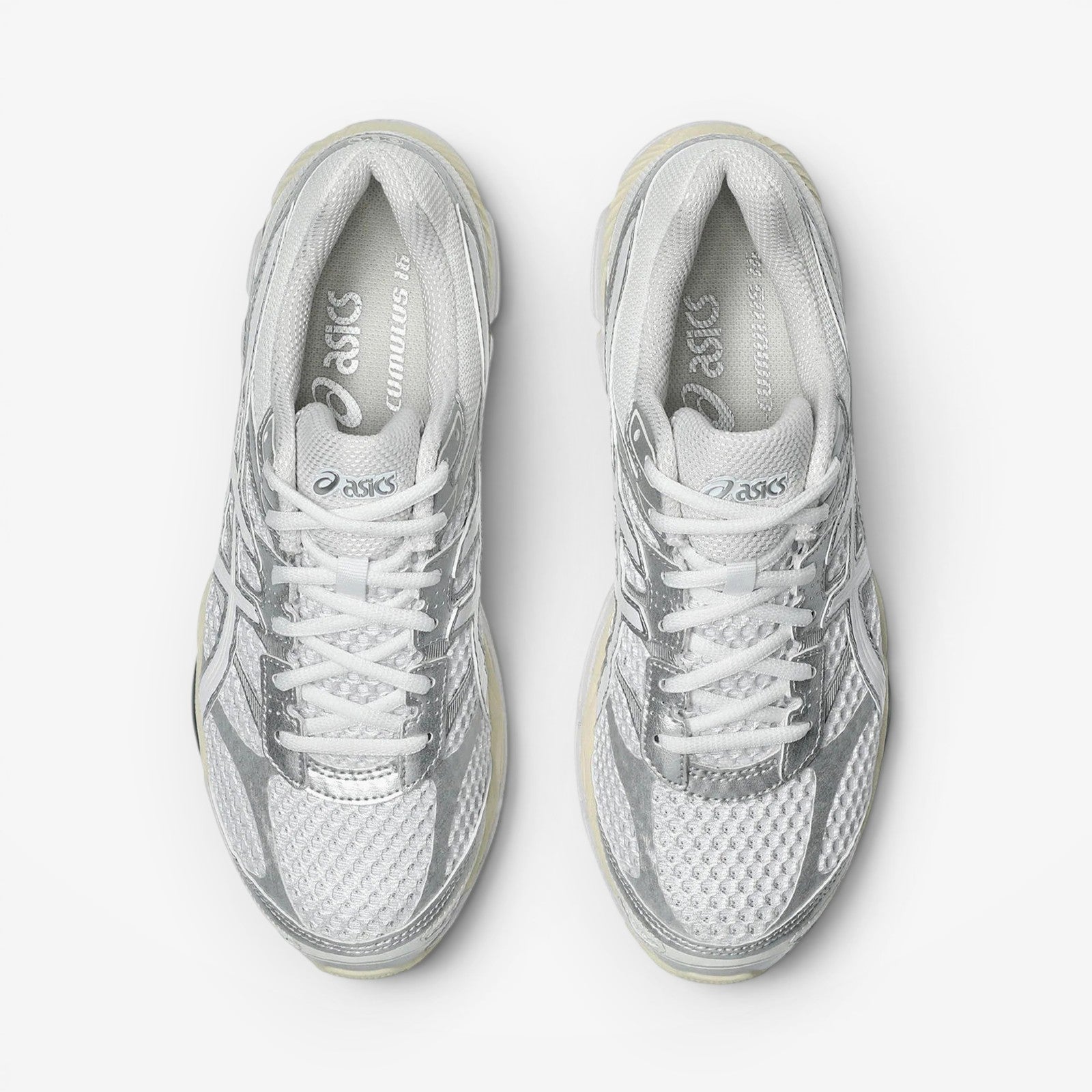 METRO ASICS GEL-Cumulus 16 white and silver mesh running shoes with synthetic overlays and lace-up closure.
