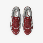 METRO ASICS GEL-NYC sneakers in beet juice red and seal grey with a layered mesh and suede design, top-down view.