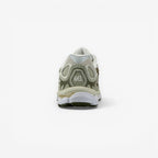 METRO ASICS GEL-NYC sneakers in Khaki and Pure Silver with GEL cushioning and mesh upper.