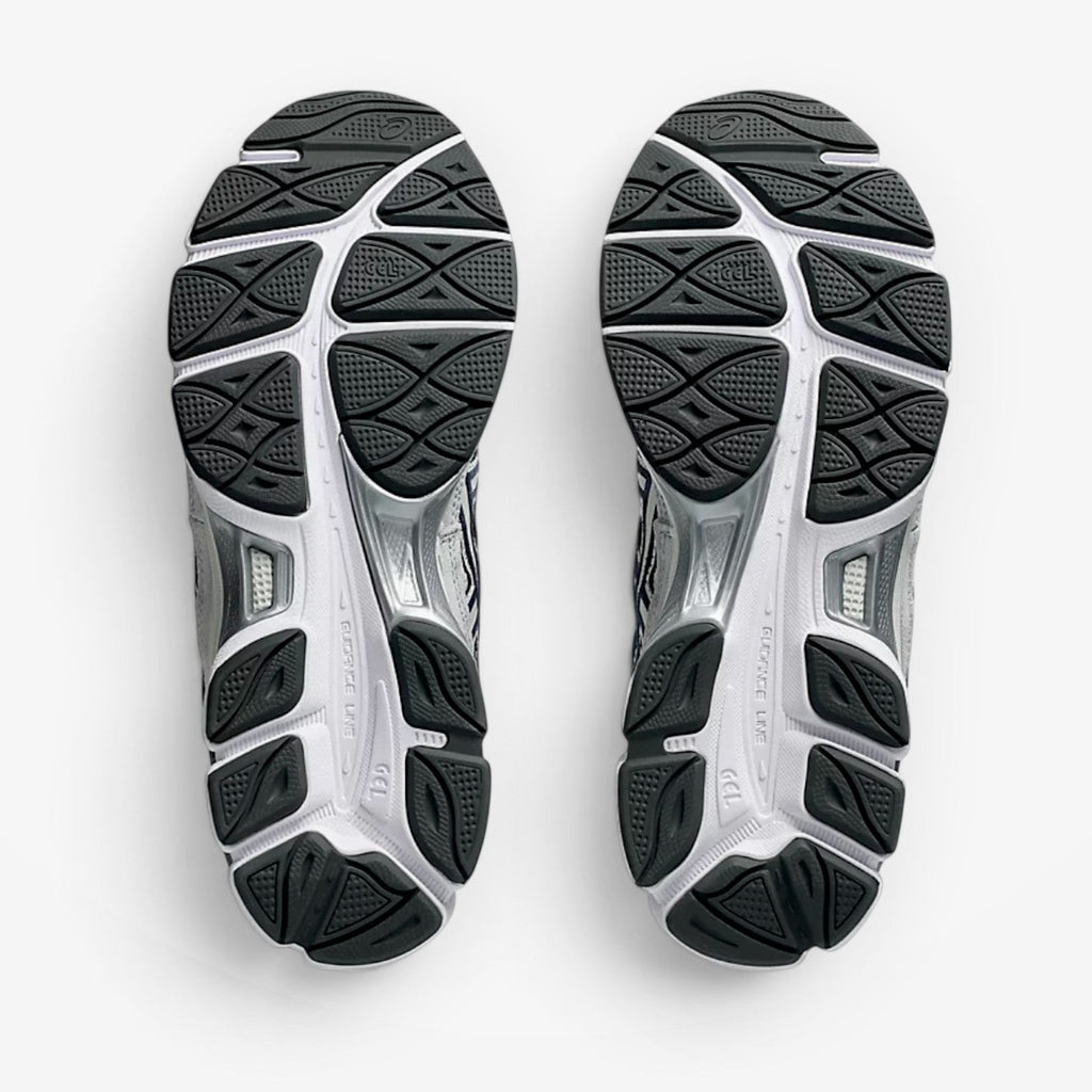 METRO ASICS GEL-NYC sneaker outsoles in white and midnight blue with durable rubber traction and GEL cushioning.