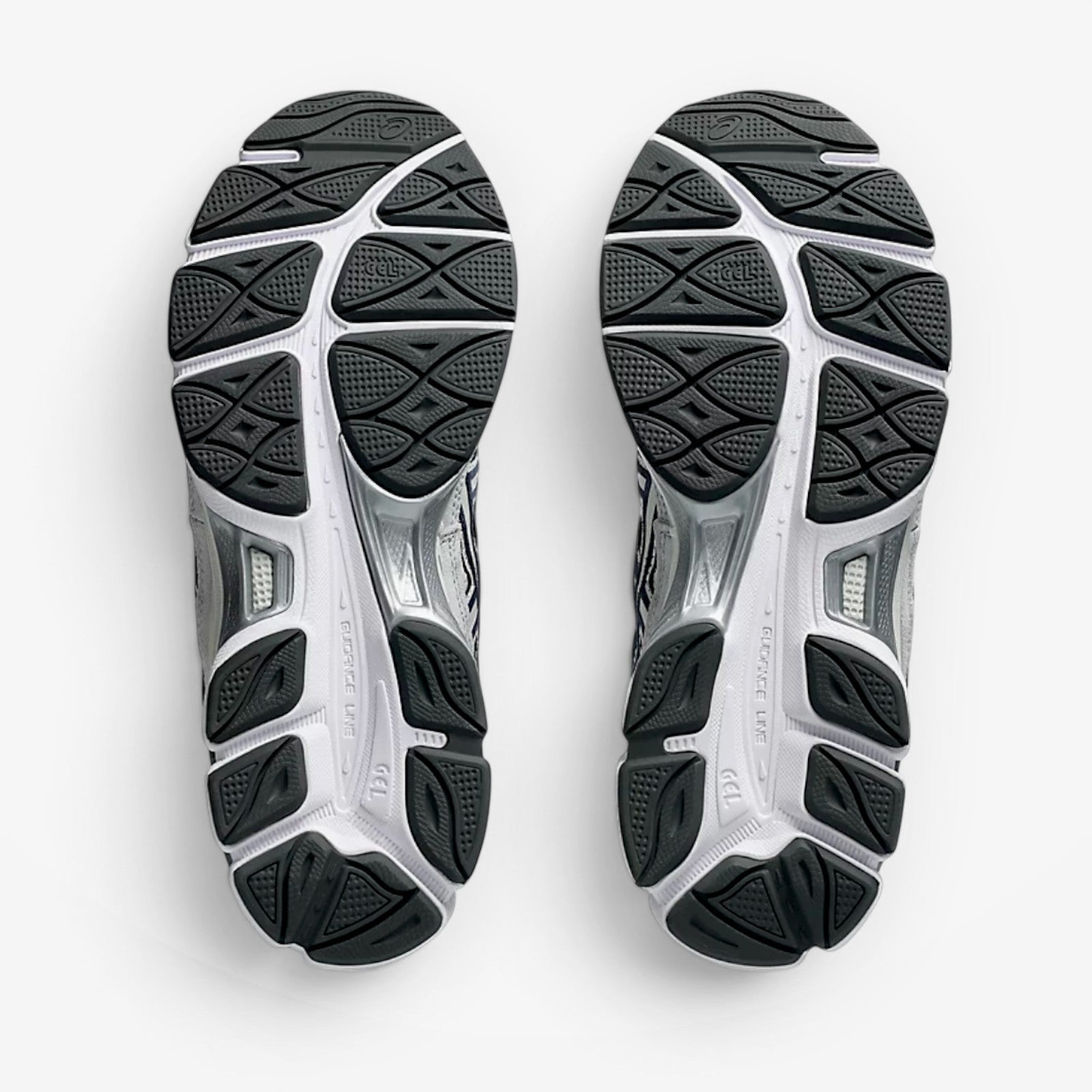METRO ASICS GEL-NYC sneaker outsoles in white and midnight blue with durable rubber traction and GEL cushioning.