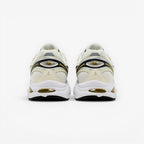 METRO ASICS GT-2160 cream and dark mustard running shoes with mesh upper and GEL cushioning.