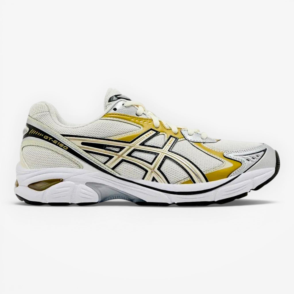METRO ASICS GT-2160 cream and dark mustard mesh running shoes with synthetic overlays and GEL cushioning.