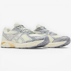 METRO ASICS GT-2160 cream and sheet rock mesh running shoes with distressed silver overlays and GEL cushioning.