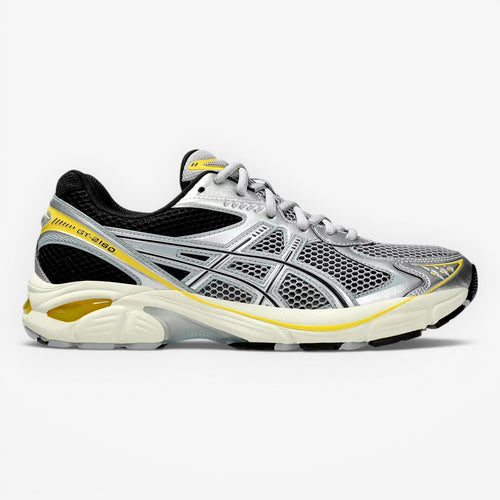 METRO Asics GT-2160 running shoes in Piedmont Grey and Pure Silver with mesh and synthetic overlays, GEL cushioning, and yellow accents.