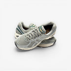 METRO ASICS GT-2160 men's running shoes in seal grey with jewel green accents, mesh upper, and GEL cushioning.