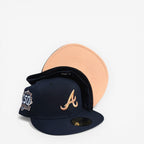 METRO Atlanta Braves 150th Anniversary navy fitted hat with peach UV underbrim and embroidered A logo.