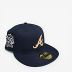 METRO Atlanta Braves 150th Anniversary navy fitted hat with peach UV underbrim and embroidered A logo.