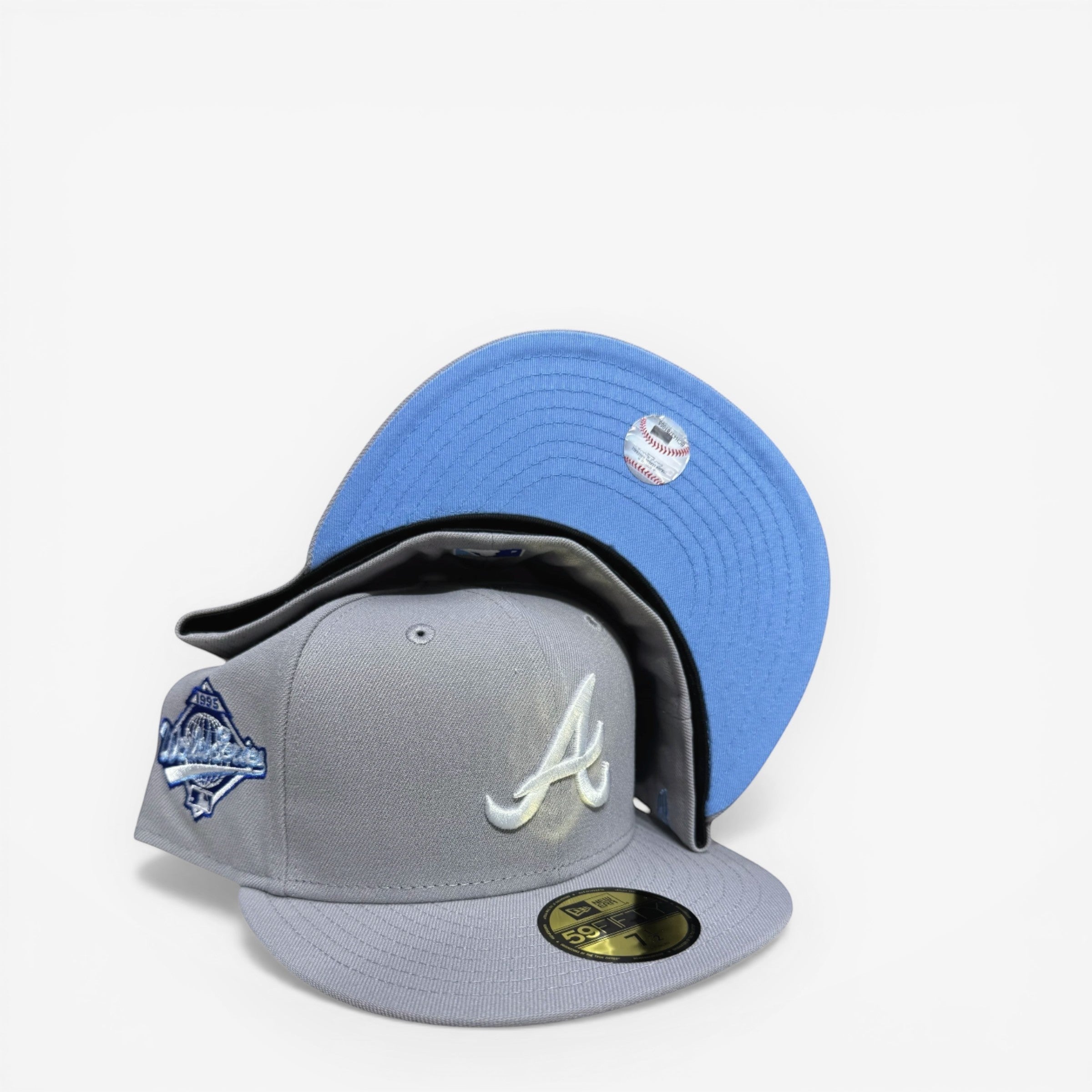 METRO Atlanta Braves 1995 World Series fitted hat in grey with white 'A' logo and light blue UV underbrim.