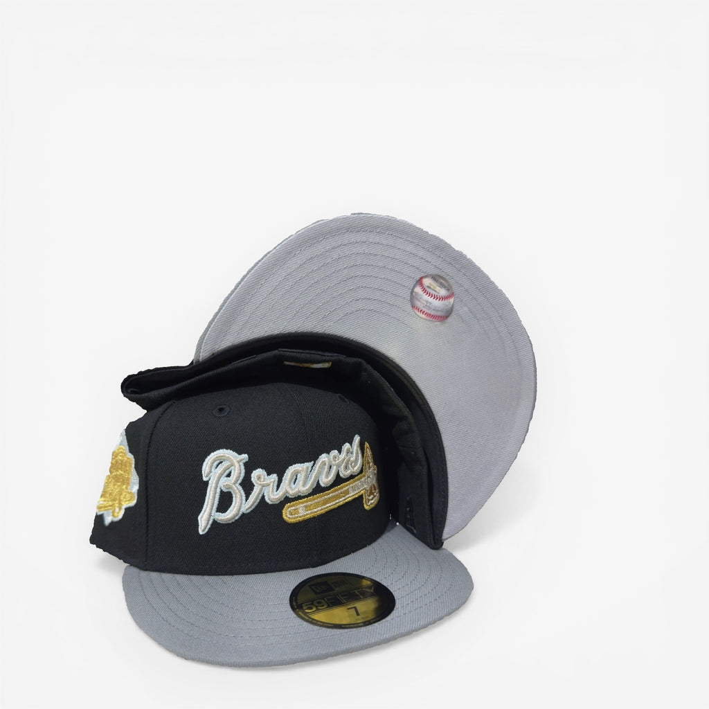 METRO Atlanta Braves 1999 World Series fitted hat in black with grey underbrim and commemorative side patch.