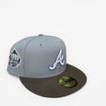 METRO Atlanta Braves 1999 World Series fitted hat in gray with a brown brim and embroidered 'A' logo. Features a 1999 World Series side patch.
