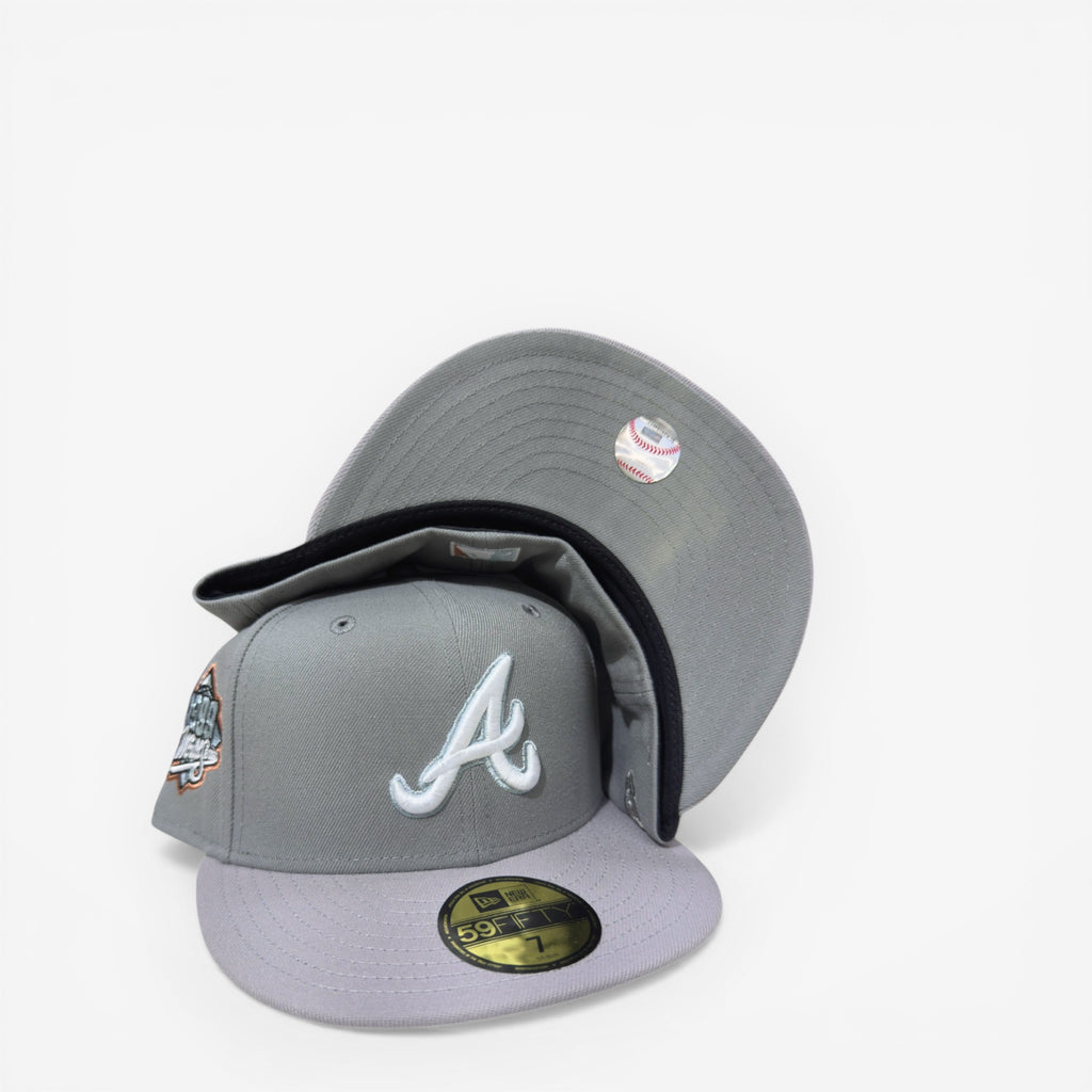 METRO Atlanta Braves 1999 World Series fitted hat in gray with white 'A' logo and commemorative patch. Gray UV underbrim.