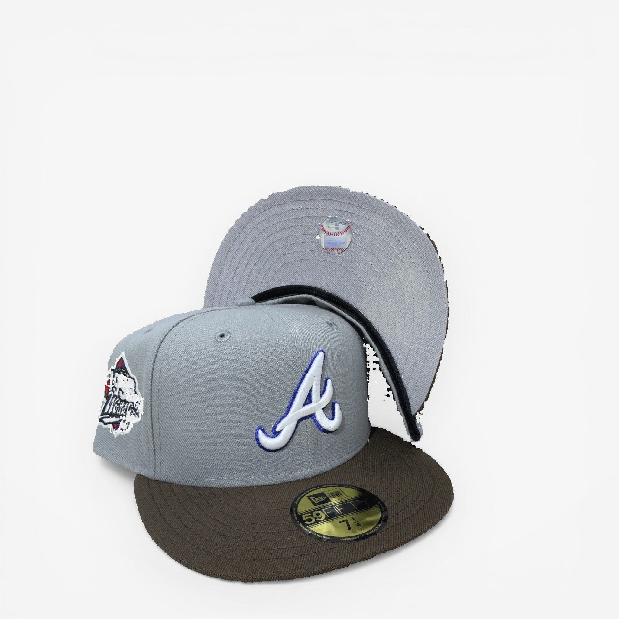 METRO Atlanta Braves 1999 World Series fitted hat in gray with brown brim and 'A' logo. Features commemorative side patch.