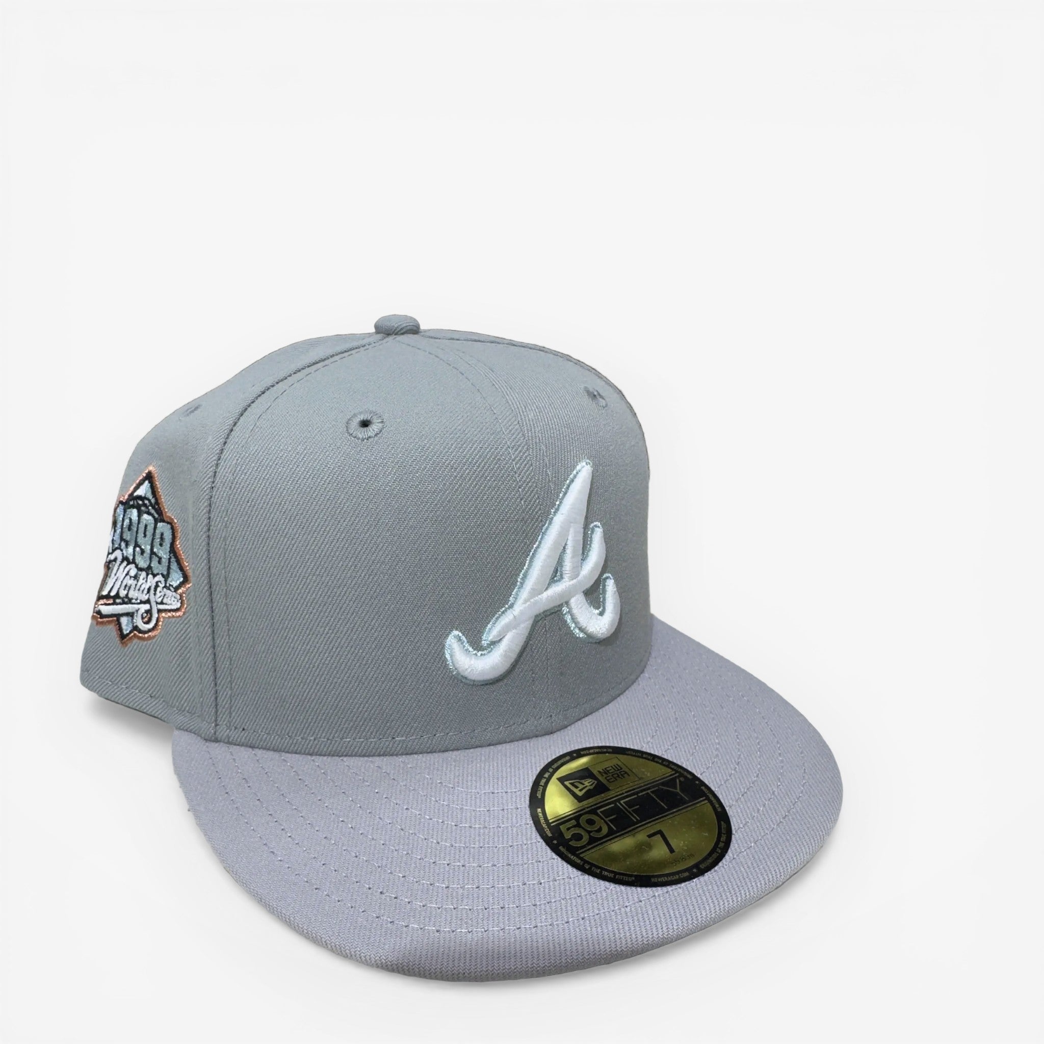 METRO Atlanta Braves 1999 World Series fitted hat in gray with white embroidered 'A' logo and commemorative side patch.