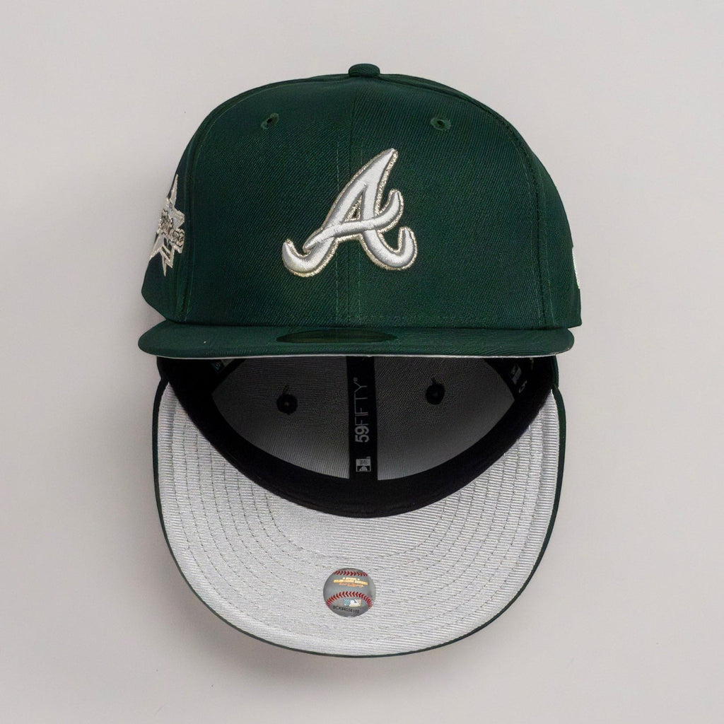 METRO Atlanta Braves green fitted hat with grey UV underbrim and Okefenokee side patch. New Era 59FIFTY silhouette.